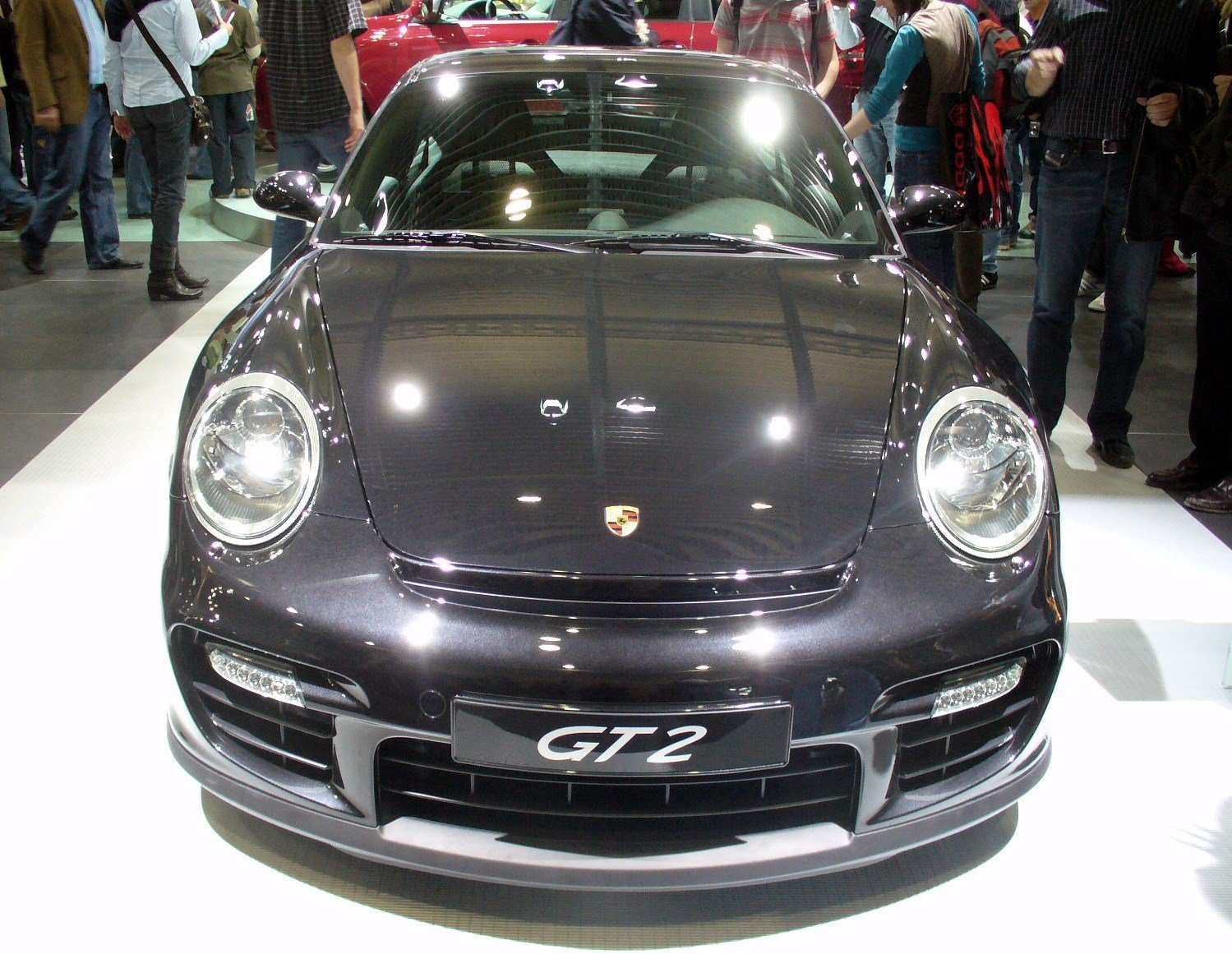 Dark grey Porsche 911 GT2, type 997, photographed head-on at AMI in 2008.
